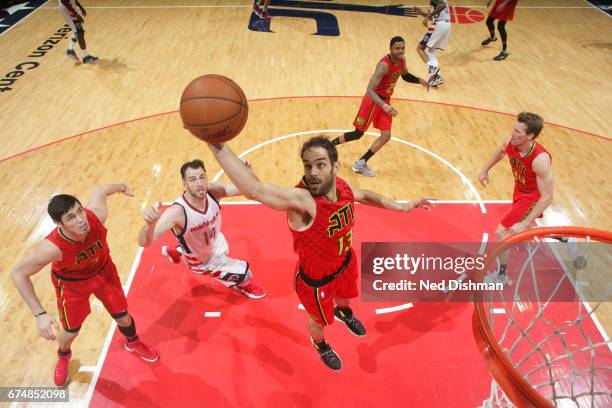 Jose Calderon of the Atlanta Hawks gets the rebound during the game against the Washington Wizards in Game Five of the Eastern Conference...