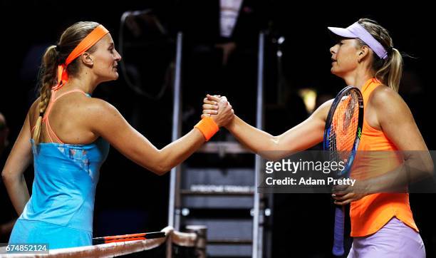 Maria Sharapova of Russia shakes hands after losing her match against Kristina Mladenovic of France during the Porsche Tennis Grand Prix at Porsche...