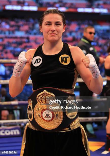 Katie Taylor celebrates victory over Nina Meinke during the WBA Lightweight Championship bout at Wembley Stadium on April 29, 2017 in London, England.