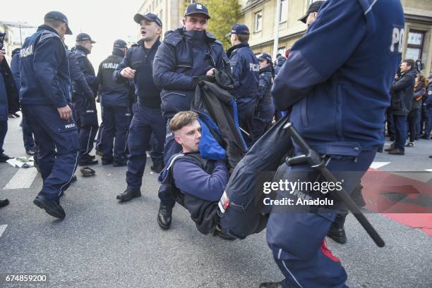 Police take some protesters into custody during a protest against the nationalist Far Right march that staged within 83rd anniversary of the ONR in...