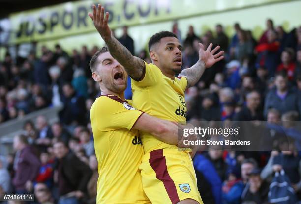 Andre Gray of Burnley celebrates scoring his team's second goal with Sam Vokes during the Premier League match between Crystal Palace and Burnley at...