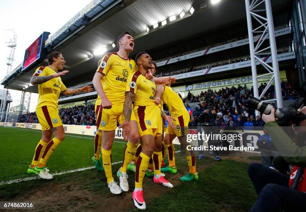 Andre Gray of Burnley celebrates scoring his team's second goal with Michael Keane during the Premier League match between Crystal Palace and Burnley...