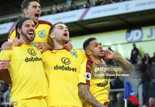 Andre Gray of Burnley celebrates scoring his team's second goal with Sam Vokes , George Boyd and Matthew Lowton of Burnley during the Premier League...