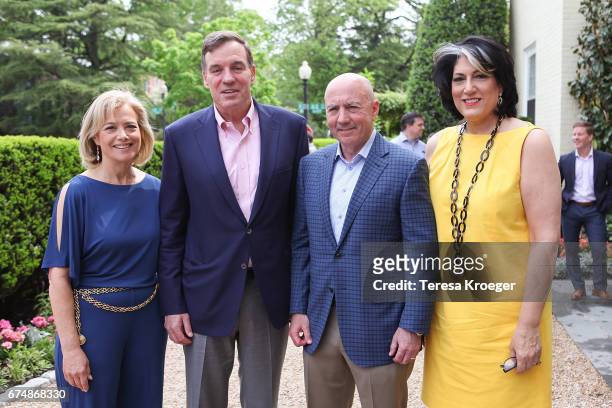 Hilary Rosen, Senator Mark Warner , Mark Testoni, and Tammy Haddad attend the Garden Brunch hosted by Tammy Haddad ahead of the White House...
