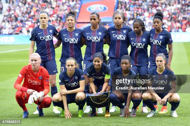 Paris Saint-Germain players pose before the Women's Champions League match between Paris Saint Germain and Barcelona at Parc des Princes on April 29,...