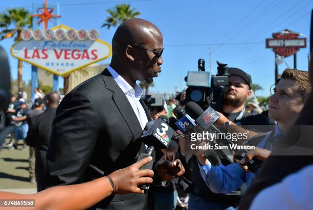 Former Oakland Raiders player Akbar Gbajabiamila is interviewed during the team's 2017 NFL Draft event at the Welcome to Fabulous Las Vegas sign on...