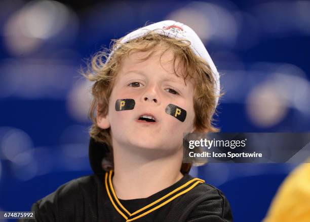 Very young Pittsburgh Pirates fan enjoys the game between the Miami Marlins and the Pittsburgh Pirates on April 28, 2017 at Marlins park, in Miami, FL