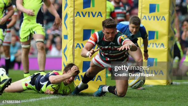 Owen Williams of Leicester dives over for their third try during the Aviva Premiership match between Leicester Tigers and Sale Sharks at Welford Road...