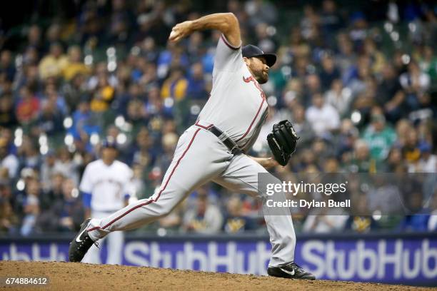 Josh Collmenter of the Atlanta Braves pitches in the seventh inning against the Milwaukee Brewers at Miller Park on April 28, 2017 in Milwaukee,...