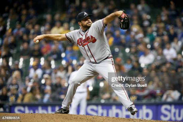 Josh Collmenter of the Atlanta Braves pitches in the seventh inning against the Milwaukee Brewers at Miller Park on April 28, 2017 in Milwaukee,...