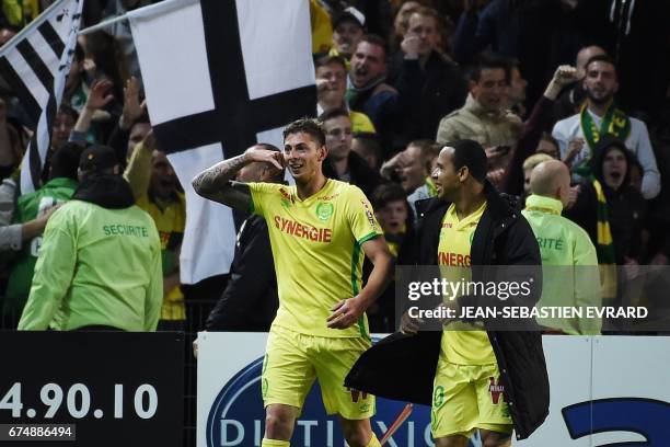 Nantes' Argentinian forward Emiliano Sala celebrates after scoring during the French L1 football match Nantes vs Lorient on April 29, 2017 at the...
