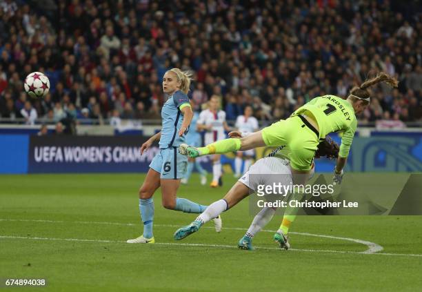 Karen Bardsley of Manchester City runs into Alex Morgan of Olympique Lyon during the UEFA Women's Champions League Semi Final second leg match...