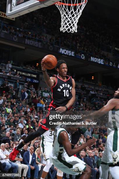 Milwaukee, WI DeMar DeRozan of the Toronto Raptors passes the ball against the Milwaukee Bucks during Game Six of the Eastern Conference...