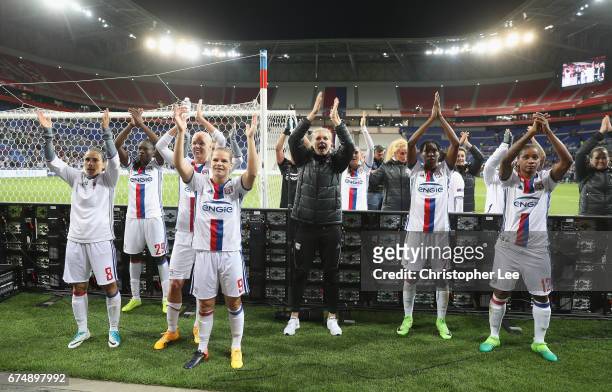 Olympique Lyon players celebrate with their fans at the end of the game during the UEFA Women's Champions League Semi Final second leg match between...