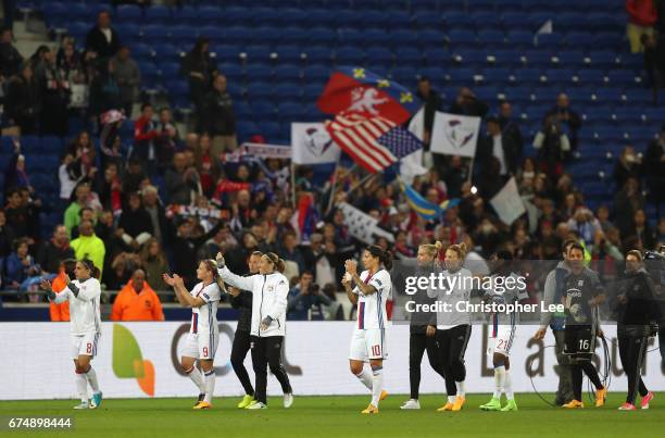 Olympique Lyon players thank the fans as they do a lap of honour during the UEFA Women's Champions League Semi Final second leg match between...