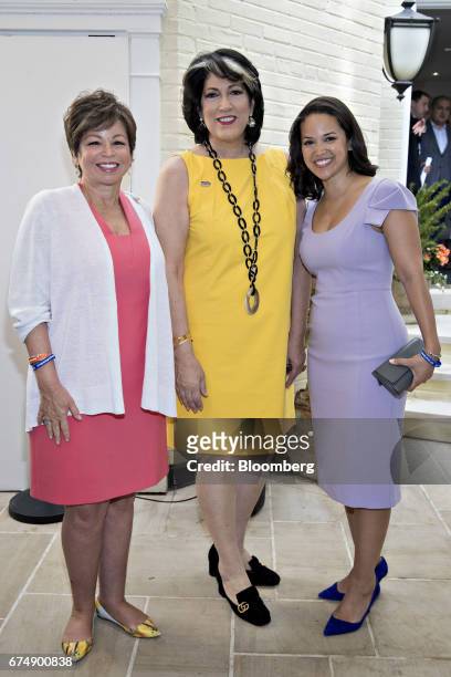 Valerie Jarrett, former senior advisor to U.S. President Barack Obama, left, her daughter Laura Jarrett, right, and Tammy Haddad, president and chief...