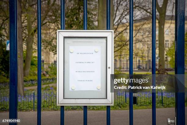 Note at the gates Palace Noordeinde saying that the public garden is closed for an private birthday party for King Willem-Alexander in the Royal...