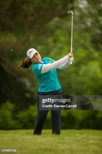 Inbee Park of South Korea plays her tee shot at the thirteenth hole during the third round of the Volunteers of America North Texas Shootout at Las...