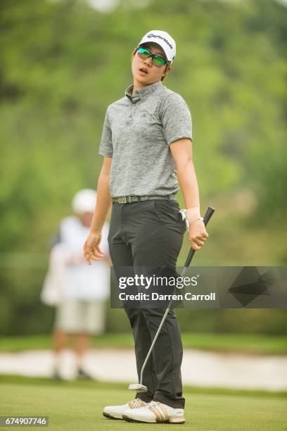 Eun-Jeong Seong of South Korea reacts to a missed putt at the tenth hole during the third round of the Volunteers of America North Texas Shootout at...