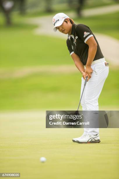 Haru Nomura of Japan putts at the fourteenth hole during the third round of the Volunteers of America North Texas Shootout at Las Colinas Country...