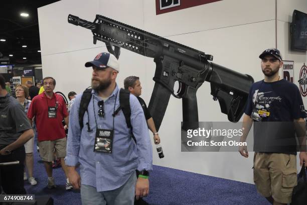National Rifle Association members visit exhibitor booths at the 146th NRA Annual Meetings & Exhibits on April 29, 2017 in Atlanta, Georgia. With...