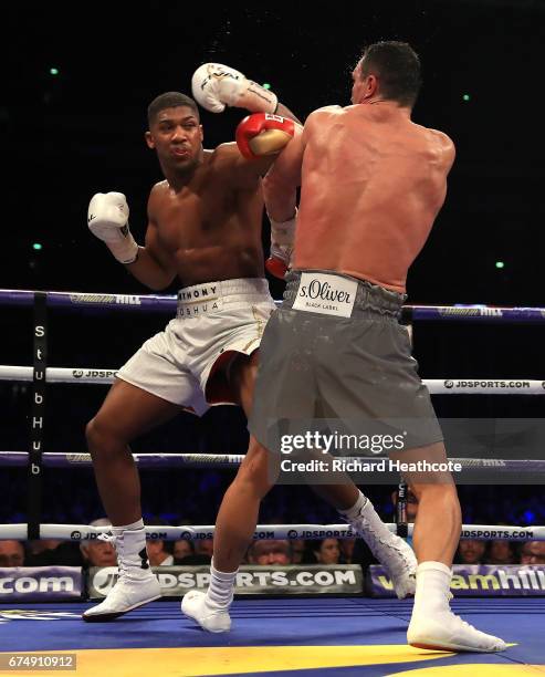 Anthony Joshua and Wladimir Klitschko in action during the IBF, WBA and IBO Heavyweight World Title bout at Wembley Stadium on April 29, 2017 in...