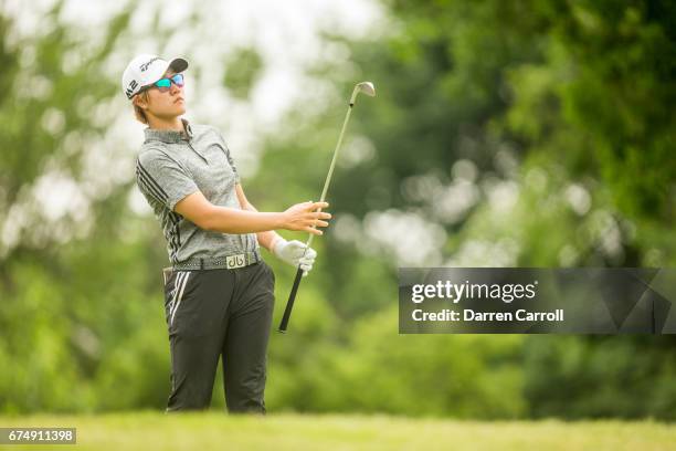 Eun-Jeong Seong of South Korea plays her tee shot at the thirteenth hole during the third round of the Volunteers of America North Texas Shootout at...