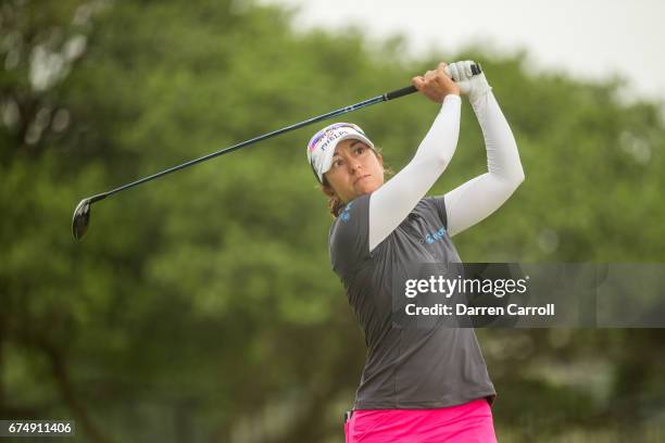 Marina Alex of the United States plays her tee shot at the second hole during the third round of the Volunteers of America North Texas Shootout at...