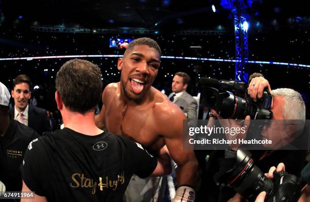 Anthony Joshua celebrates victory over Wladimir Klitschko in the IBF, WBA and IBO Heavyweight World Title bout at Wembley Stadium on April 29, 2017...