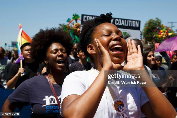 Participants of a peace rally, march through the streets, marking the 25th anniversary of the LA riots, on April 29, 2017 in Los Angeles, California....