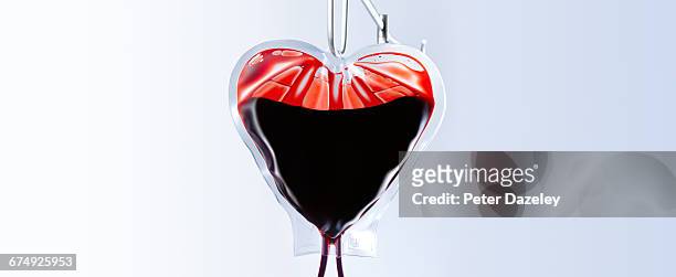 heart shaped blood bag close up - blodtransfusionspåse bildbanksfoton och bilder