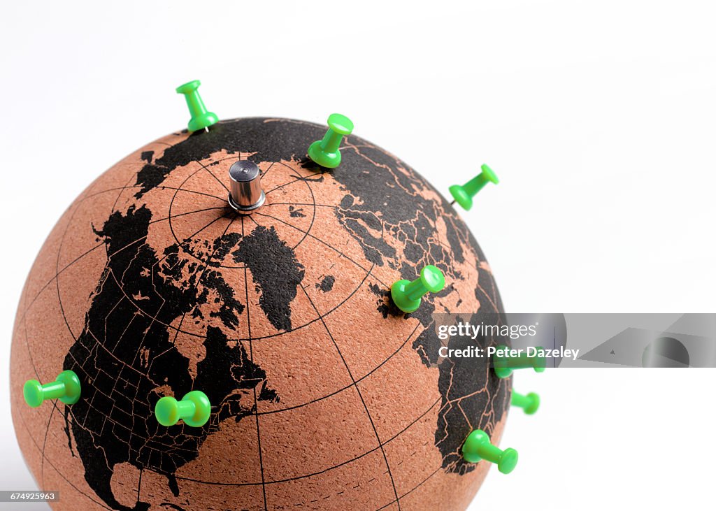 Globe with push pin destinations