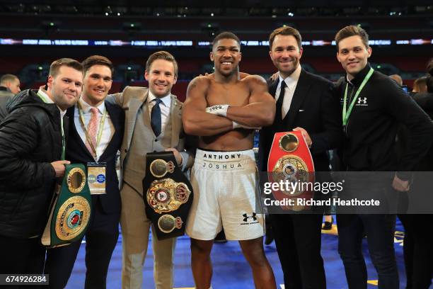 Anthony Joshua celebrates with his management team after victory over Wladimir Klitschko in the IBF, WBA and IBO Heavyweight World Title bout at...