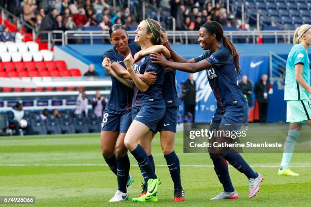 Sabrina Delannoy of Paris Saint-Germain is celebrating her goal from a penalty shot with her teammates Marie-Laure Delie and Grace Geyoro of Paris...