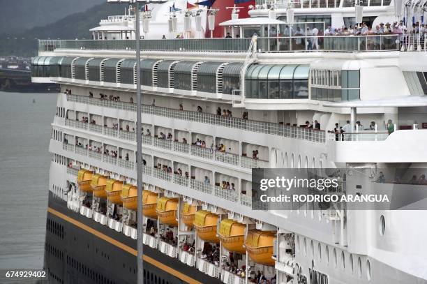 View of the "Disney Wonder", the first-ever cruise ship to go through the expanded locks of the Panama Canal, at the Cocoli locks in Panama City on...