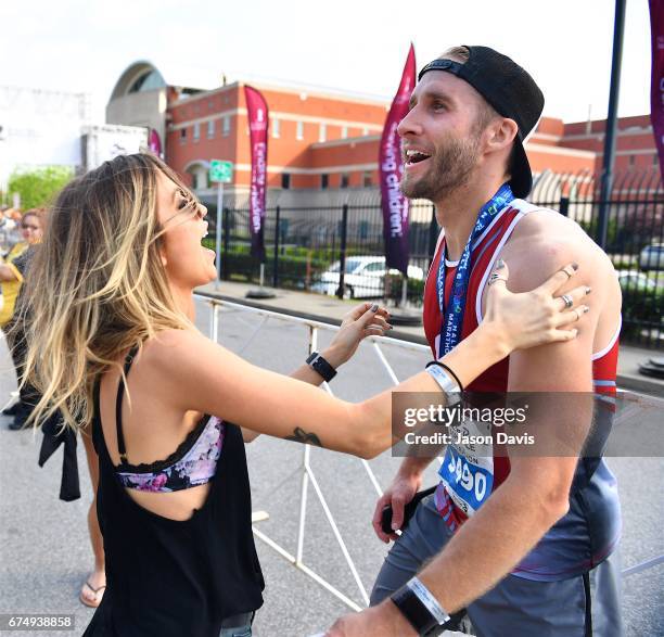 Kaitlyn Bristowe and Shawn Booth celebrate after the St. Jude Rock 'n' Roll Nashville Marathon on April 29, 2017 in Nashville, Tennessee.