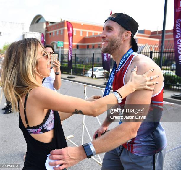 Kaitlyn Bristowe and Shawn Booth celebrate after the St. Jude Rock 'n' Roll Nashville Marathon on April 29, 2017 in Nashville, Tennessee.