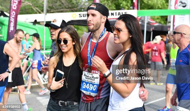 Kaitlyn Bristowe, Shawn Booth and Meghann Booth celebrate after the St. Jude Rock 'n' Roll Nashville Marathon on April 29, 2017 in Nashville,...