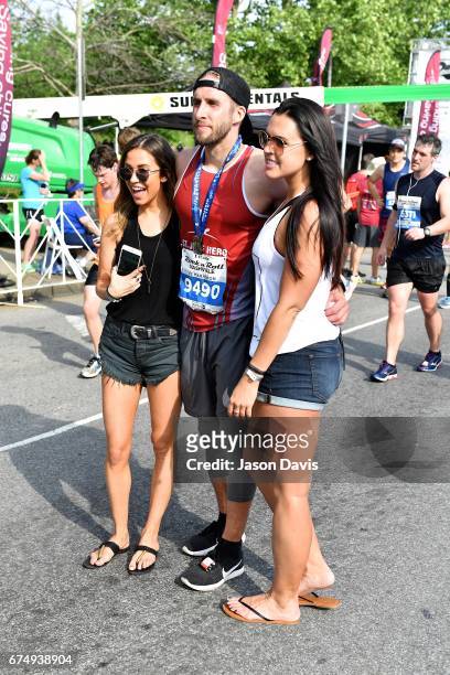 Kaitlyn Bristowe, Shawn Booth and Meghann Booth celebrate after the St. Jude Rock 'n' Roll Nashville Marathon on April 29, 2017 in Nashville,...