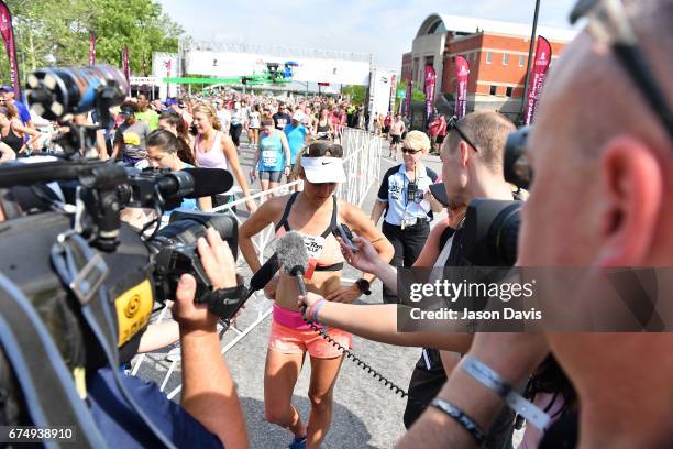 Competitor Lauren Mitchell celebrates after finishing the St. Jude Rock 'n' Roll Nashville Marathon on April 29, 2017 in Nashville, Tennessee.