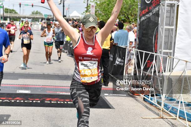 Recording Artist Kellie Pickler finishes her race during the St. Jude Rock 'n' Roll Nashville Marathon on April 29, 2017 in Nashville, Tennessee.