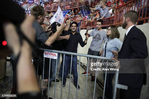 Protester is led away during a "Make America Great Again Rally"at the Pennsylvania Farm Show Complex & Expo Center April 29, 2017 in Harrisburg,...