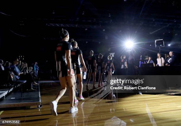 The Magpies make their way onto the court for the round 10 Super Netball match between the Magpies and the Firebirds at the Silverdome on April 30,...