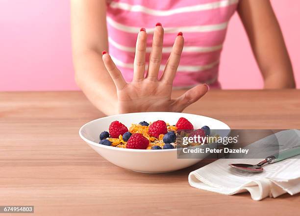 anorexic teenager - breakfast bowl stock pictures, royalty-free photos & images