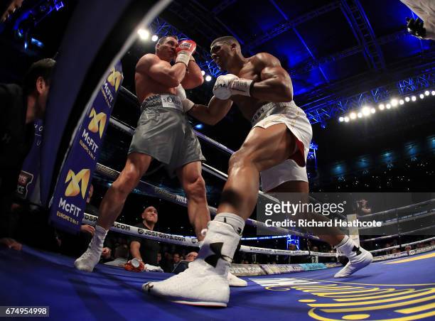 Anthony Joshua and Wladimir Klitschko in action during the IBF, WBA and IBO Heavyweight World Title bout at Wembley Stadium on April 29, 2017 in...