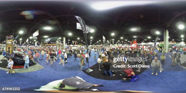 National Rifle Association members visit exhibitor booths at the 146th NRA Annual Meetings & Exhibits on April 29, 2017 in Atlanta, Georgia. With...