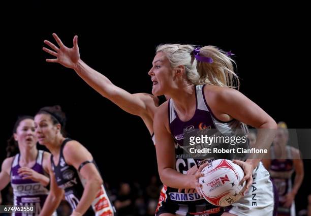 Gretel Tippett of the Firebirds looks to pass the ball during the round 10 Super Netball match between the Magpies and the Firebirds at the...