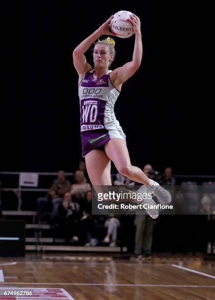 Gabi Simpson of the Firebirds leaps for the ball during the round 10 Super Netball match between the Magpies and the Firebirds at the Silverdome on...