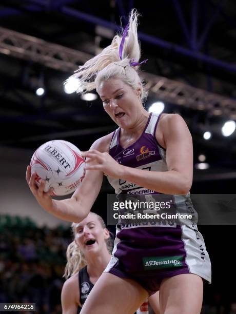 Gretel Tippett of the Firebirds takes the ball during the round 10 Super Netball match between the Magpies and the Firebirds at the Silverdome on...