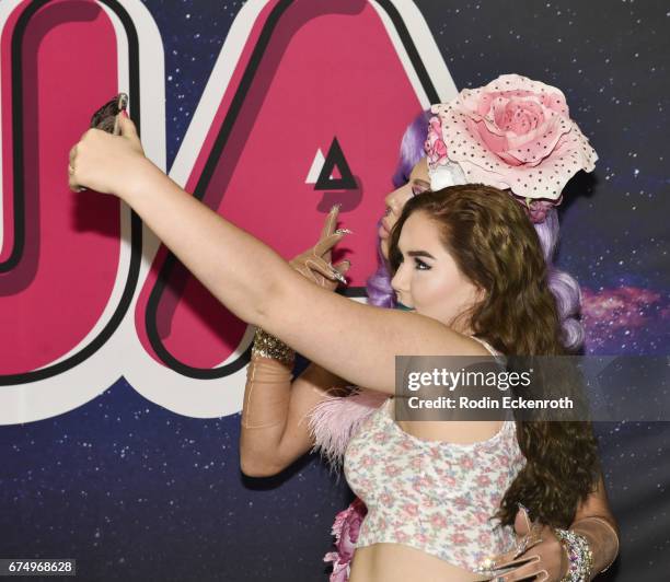 RuPaul's Drag Race Season 9 alumni Aja takes selfie with fan at 3rd annual RuPaul's DragCon at Los Angeles Convention Center on April 29, 2017 in Los...